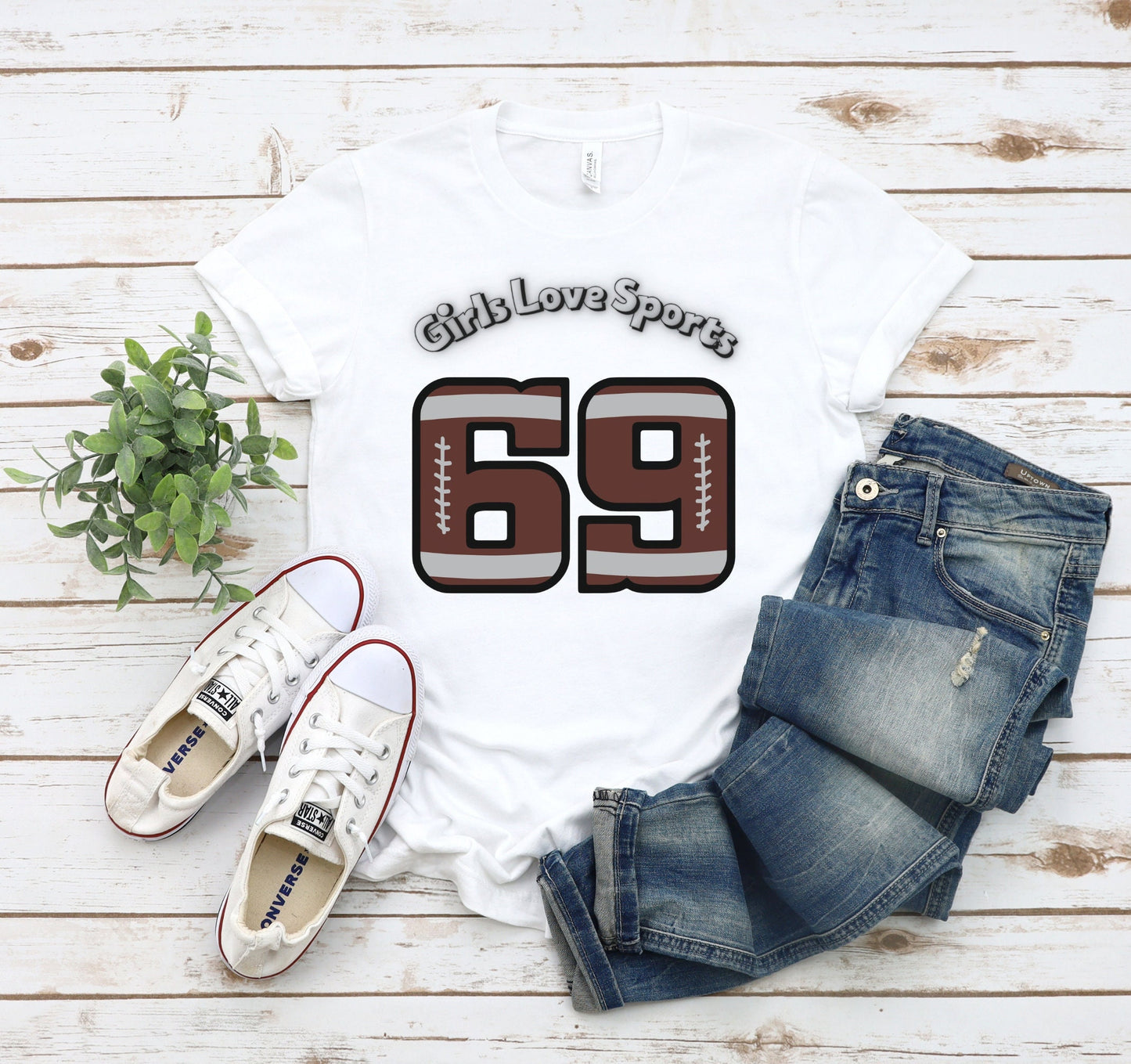 Awesome Graphic Tee Shirt for Women who love sports and have Bad Girl sense of Humor. The Shirt has the number 69 which has the patter of a Football and says Girls Love Sports above in a curved fashion.
www.scorpiontees.etsy.com