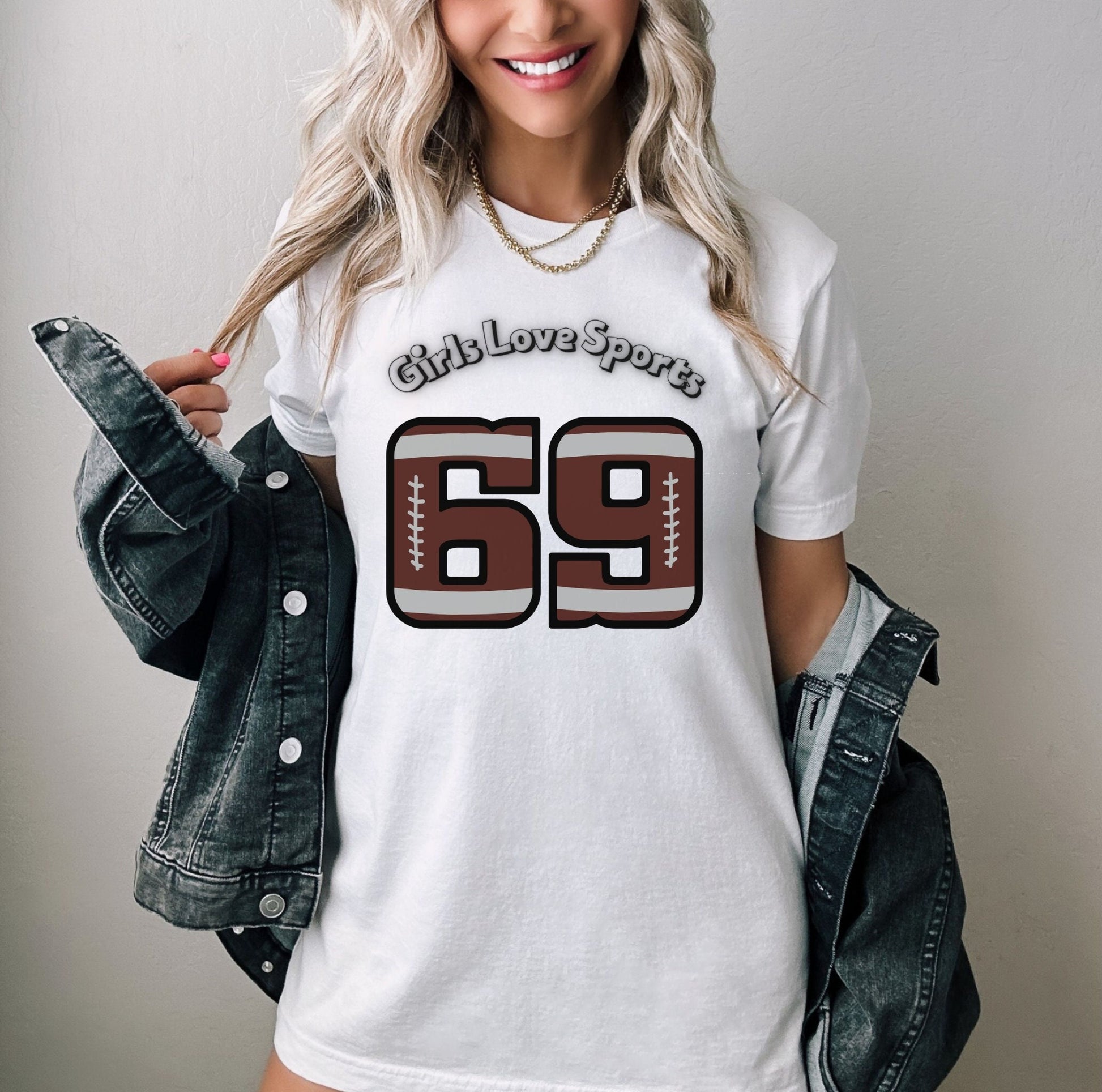 Awesome Graphic Tee Shirt for Women who love sports and have Bad Girl sense of Humor. The Shirt has the number 69 which has the patter of a Football and says Girls Love Sports above in a curved fashion.
www.scorpiontees.etsy.com