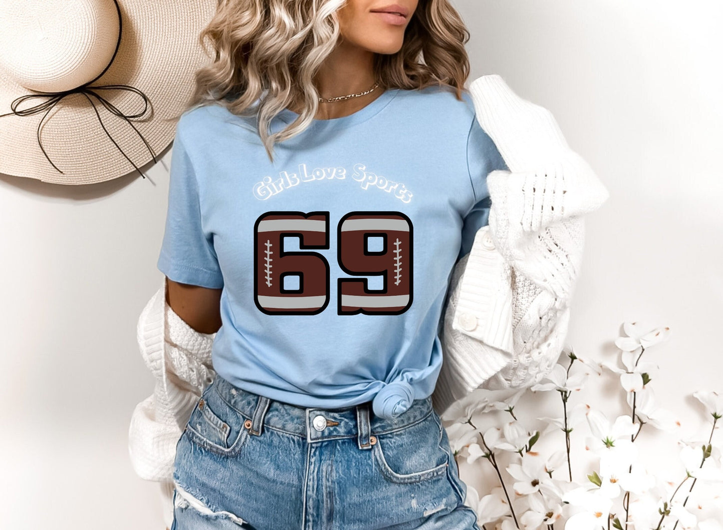 Awesome Graphic Tee Shirt for Women who love sports and have Bad Girl sense of Humor. The Shirt has the number 69 which has the patter of a Football and says Girls Love Sports above in a curved fashion.
www.scorpiontees.etsy.com