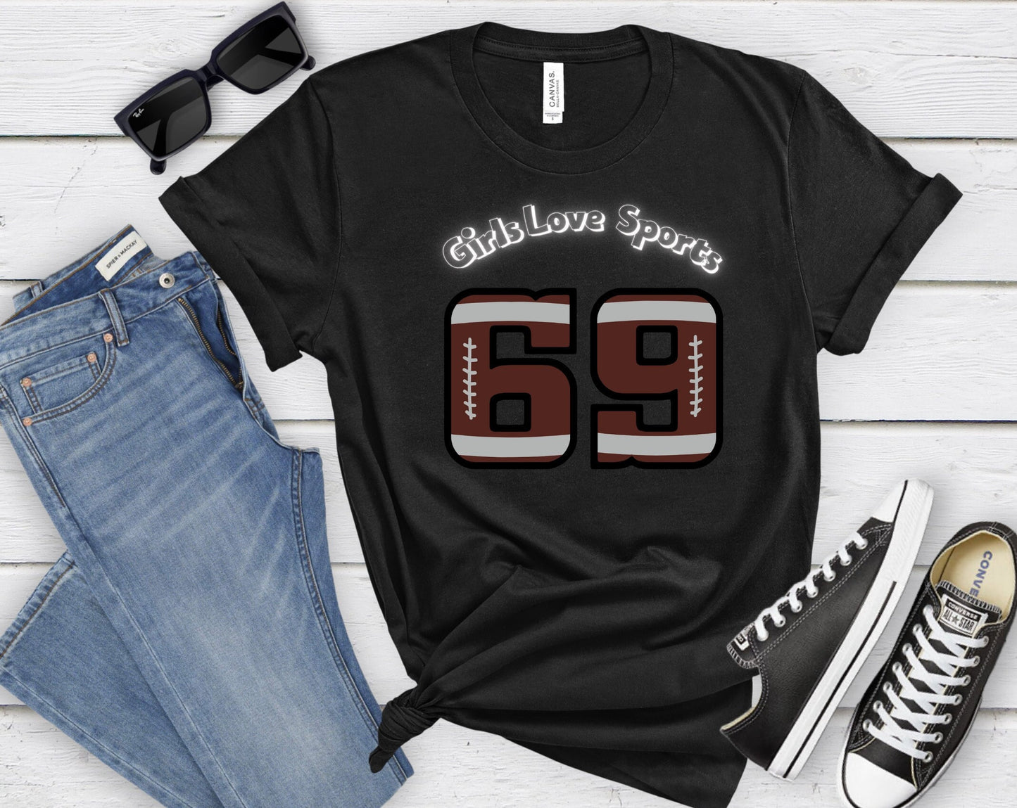 Awesome Graphic Tee Shirt for Women who love sports and have Bad Girl sense of Humor. The Shirt has the number 69 which has the patter of a Football and says Girls Love Sports above in a curved fashion.
www.scorpiontees.etsy.com