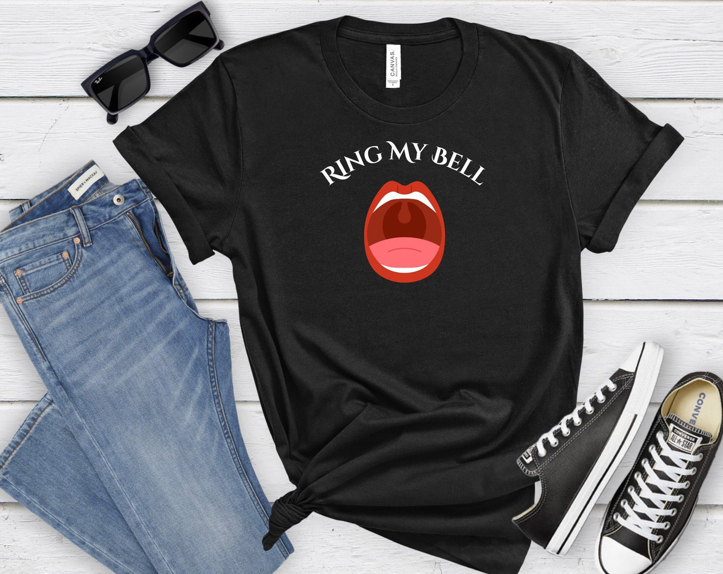 Funny and Naughty t Shirt with the words Ring My Bell written on a Curve.  Beneath the words is image of an Open Mouth With the Uvula visible.  The Uvula symbolizes the bell to be rung.  www.scorpiontees.etsy.com