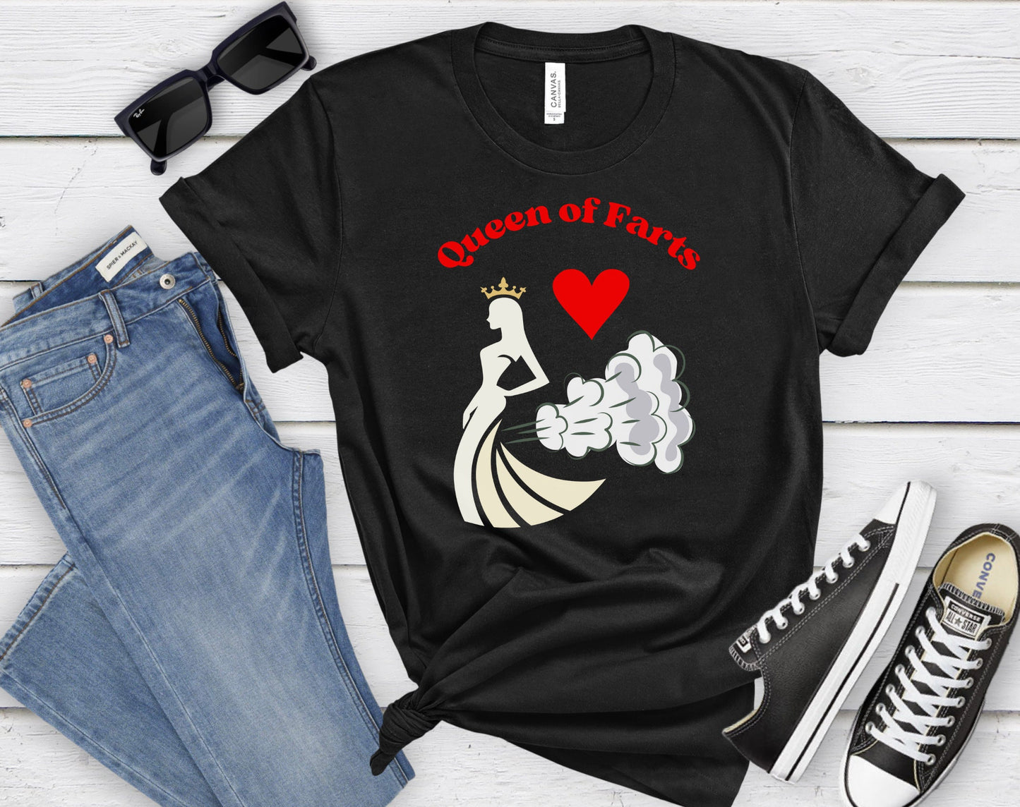 Funny T shirt with the words Queen of Hearts in Red.  The main image is of a queen with her crown and what appears as smoke trailing behind her. There is a red heart between the queen and the words.  See more great shirts at www.scorpiontees.etsy.com