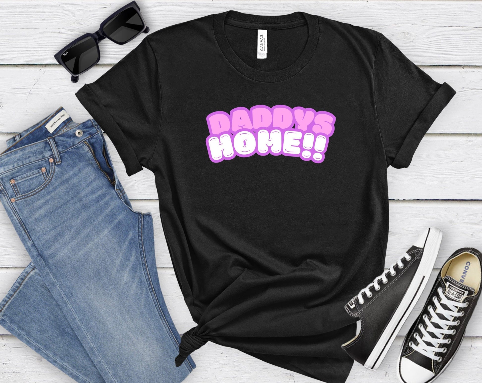 Bella and Canvas 3001 T-Shirt with the words Daddys Home in a really cute pink and white font. The font has a soft purple outline. Very cute and trendy shirt for that special someone. www.scorpiontees.etsy.com