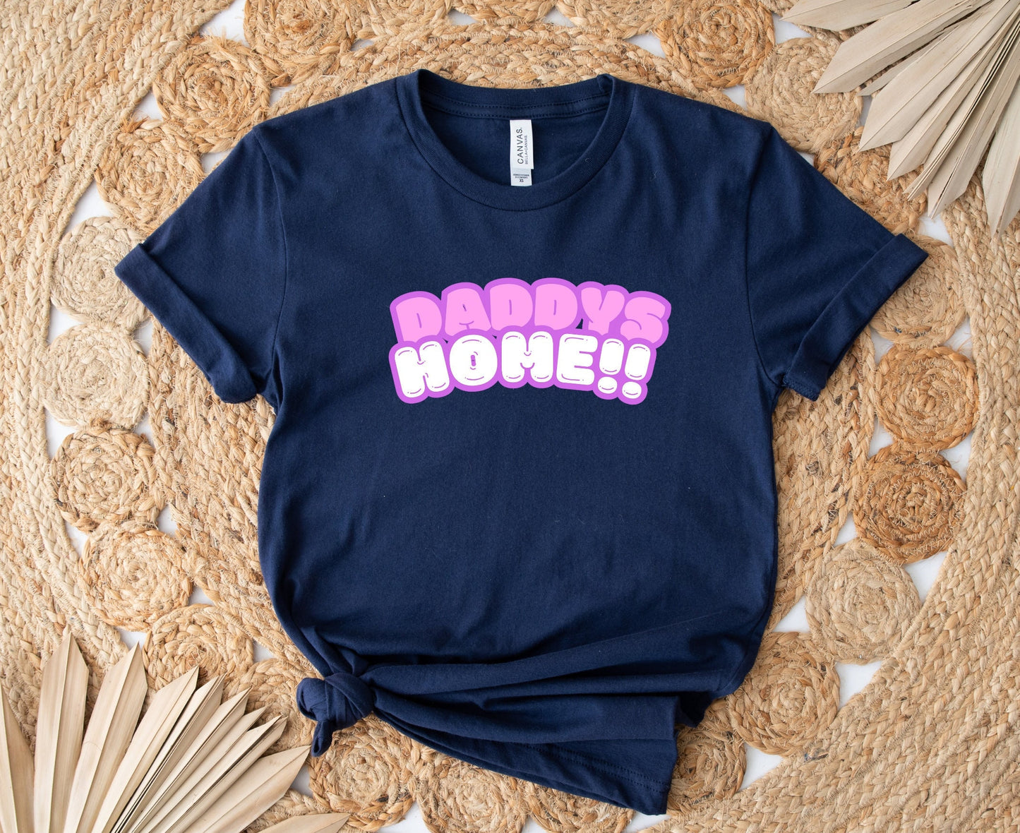 Bella and Canvas 3001 T-Shirt with the words Daddys Home in a really cute pink and white font. The font has a soft purple outline. Very cute and trendy shirt for that special someone. www.scorpiontees.etsy.com