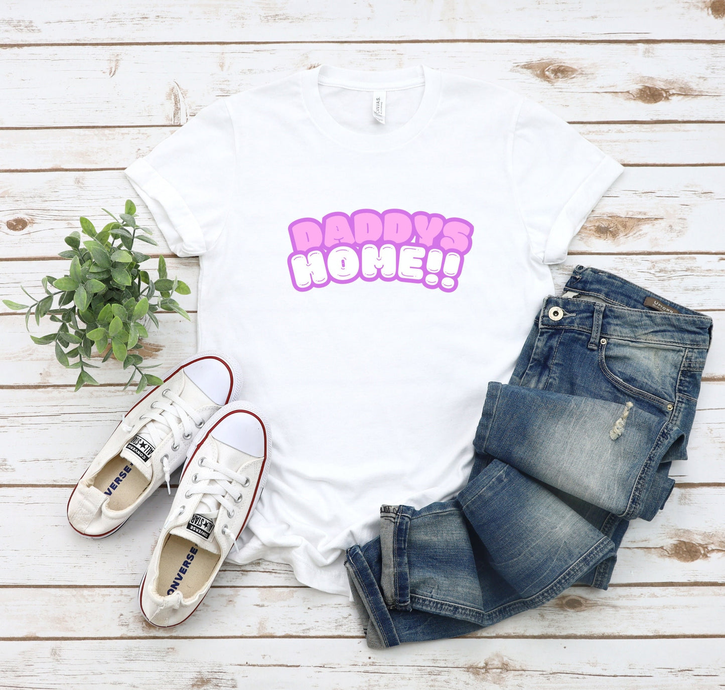 Bella and Canvas 3001 T-Shirt with the words Daddys Home in a really cute pink and white font. The font has a soft purple outline. Very cute and trendy shirt for that special someone. www.scorpiontees.etsy.com