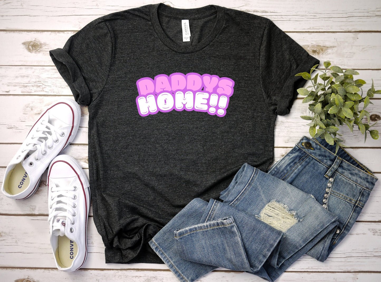 Bella and Canvas 3001 T-Shirt with the words Daddys Home in a really cute pink and white font. The font has a soft purple outline. Very cute and trendy shirt for that special someone. www.scorpiontees.etsy.com