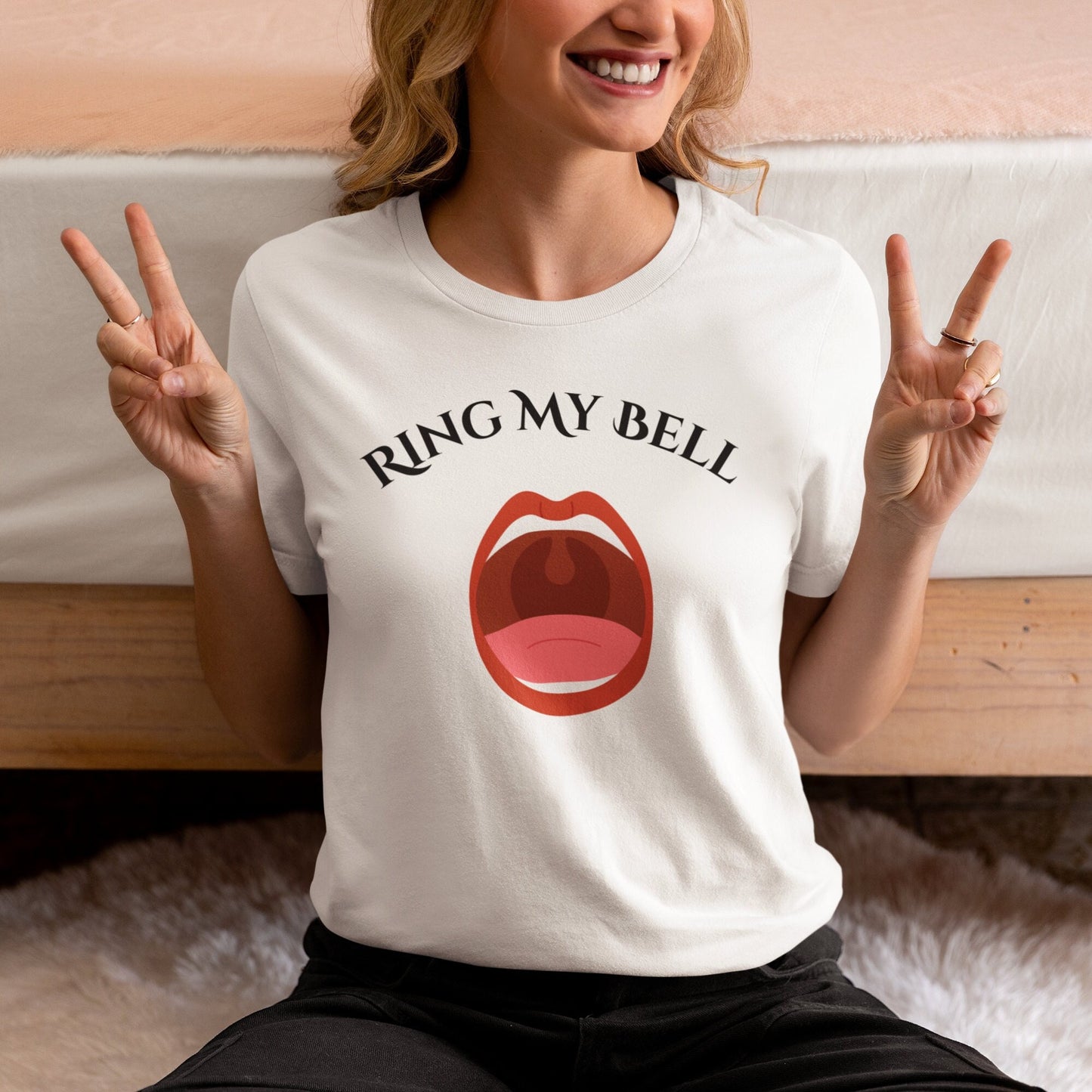 Funny and Naughty t Shirt with the words Ring My Bell written on a Curve.  Beneath the words is image of an Open Mouth With the Uvula visible.  The Uvula symbolizes the bell to be rung.  www.scorpiontees.etsy.com