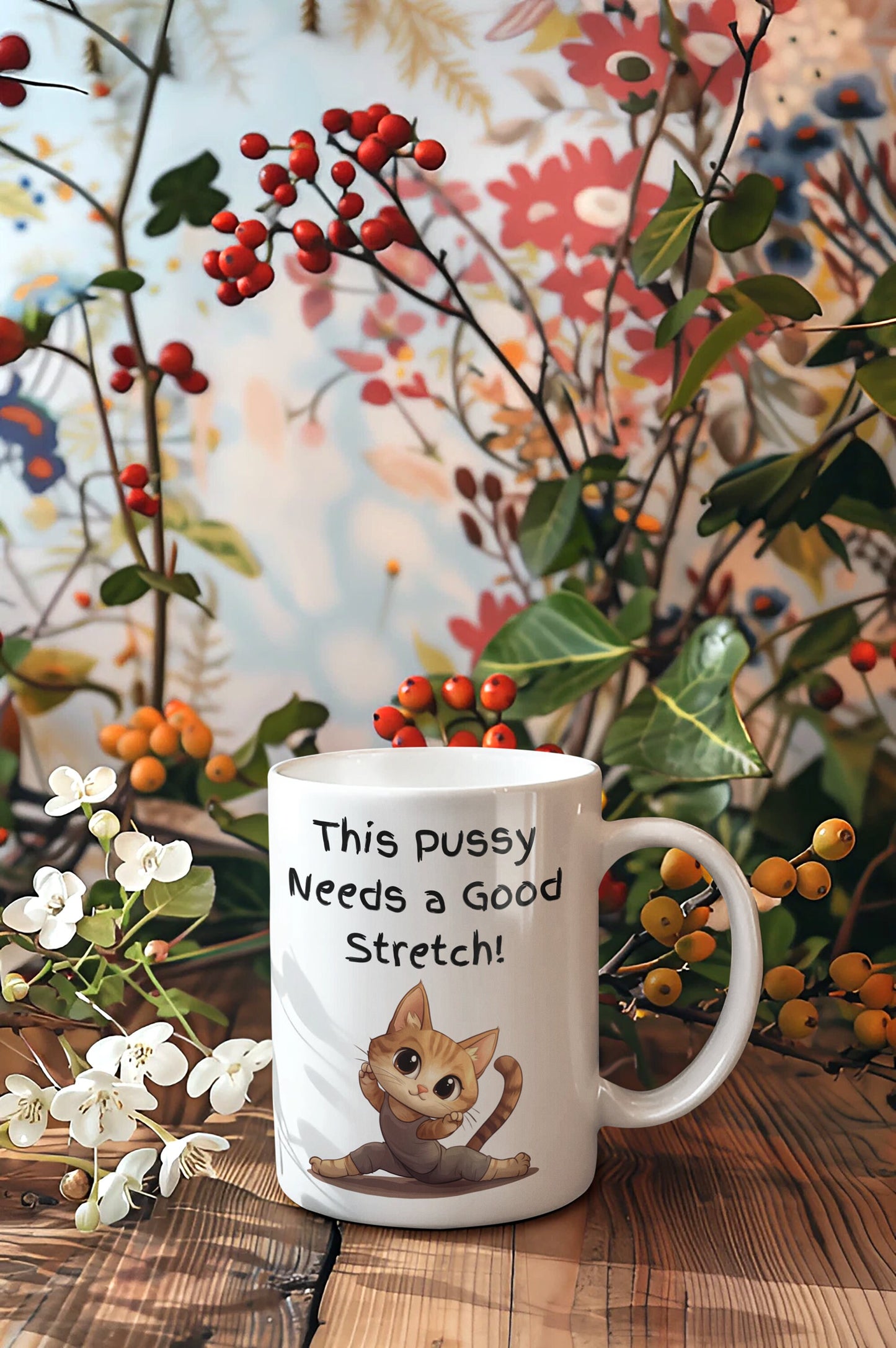 White Ceramic 11oz coffee mug with the Words This pussy needs a good stretch in finger paint font. Below the words there is a Cartoon cat stretching doing a split. Hilarious sexy mug for you coffee tea or favorite drink 
www.scorpiontees.etsy.com