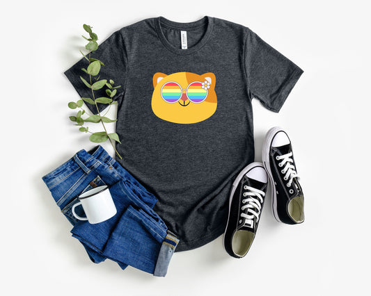 Super cute cat with rainbow glasses shirt blue hat, Rainbow glasses on an adorable cat, precious cat showing off pride. Beautiful pride cat