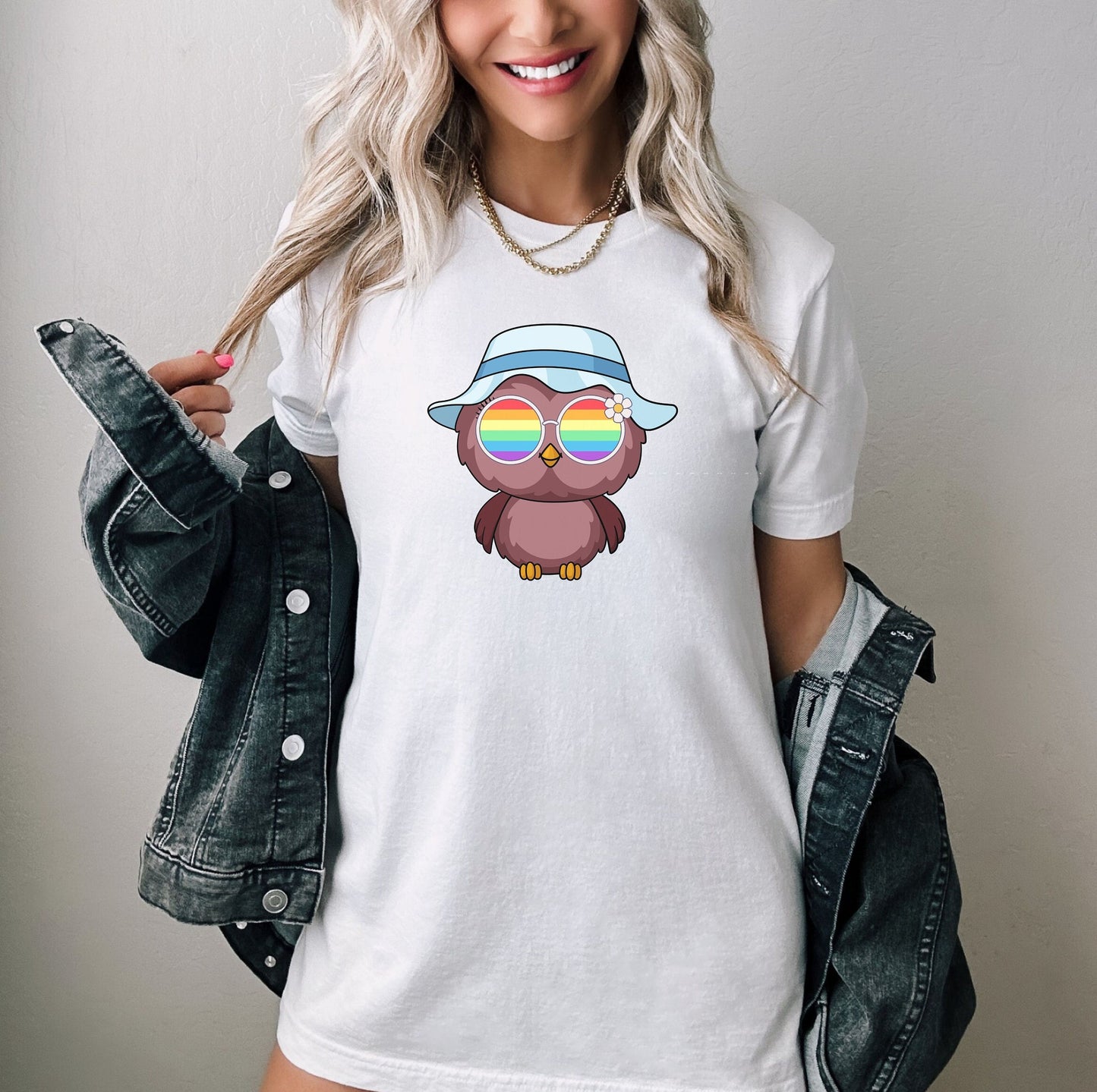 Super cute owl with rainbow glasses shirt blue hat, Rainbow glasses on an adorable owl, precious owl showing off pride. Beautiful pride owl