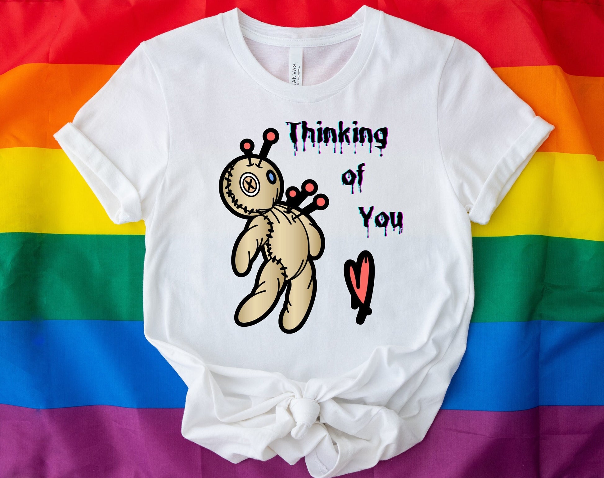 Thinking of you Voodoo doll T shirt. Scorned lover or sarcastic thoughts as voodoo doll is being stuck with pins in his heart. Hilariously cute design on a comfortable T shirt.  Perfect gift for Halloween or just for fun.
www.scorpiontees.etsy.com