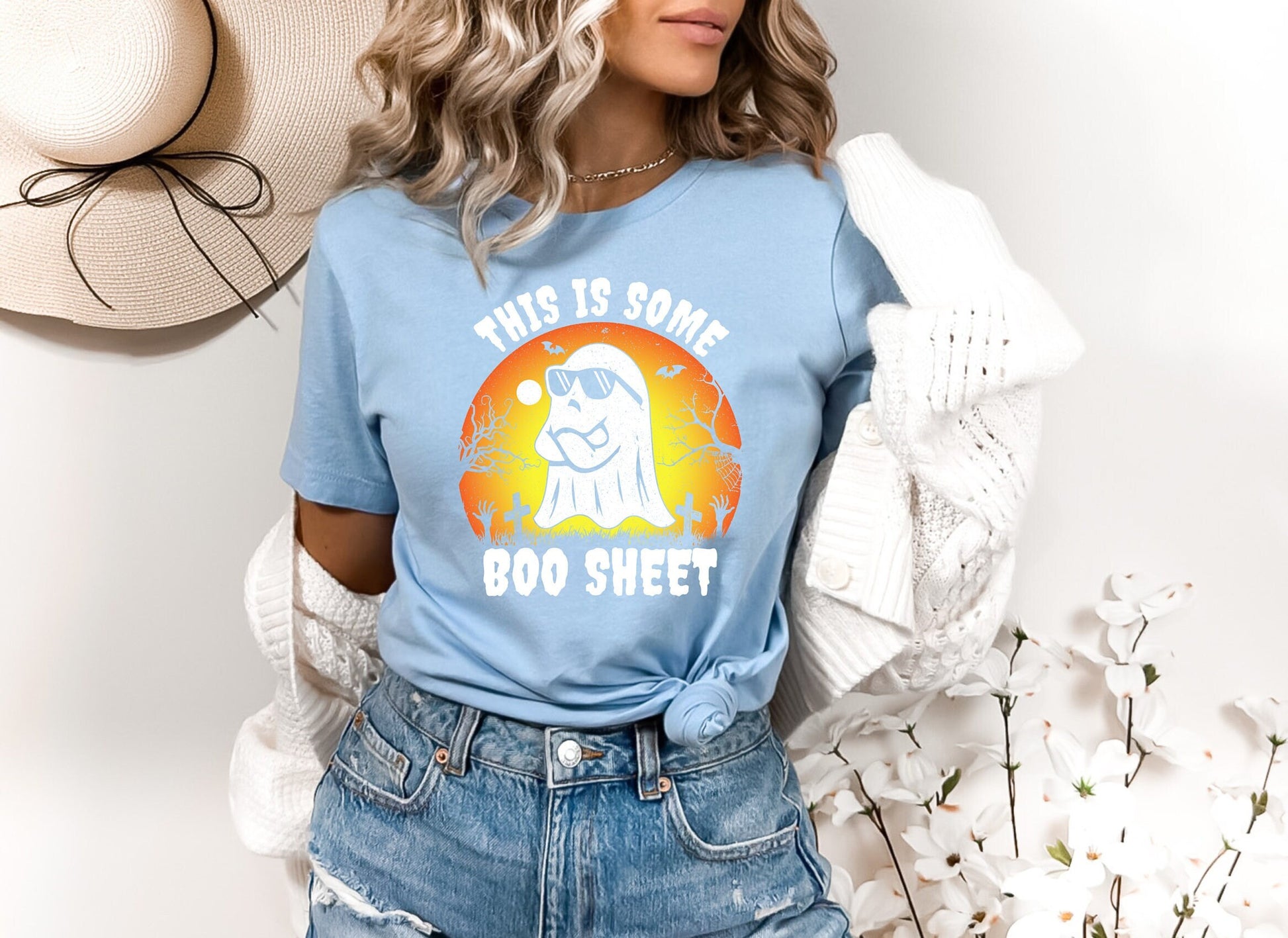 This is some Boo sheet Halloween Ghost shirt, A hilariously cute design on a stylish and comfortable T shirt. Annoyed ghost with sunglasses on a graveyard background.  A perfect Halloween gift that can be worn all year long.
www.scorpiontees.etsy.com