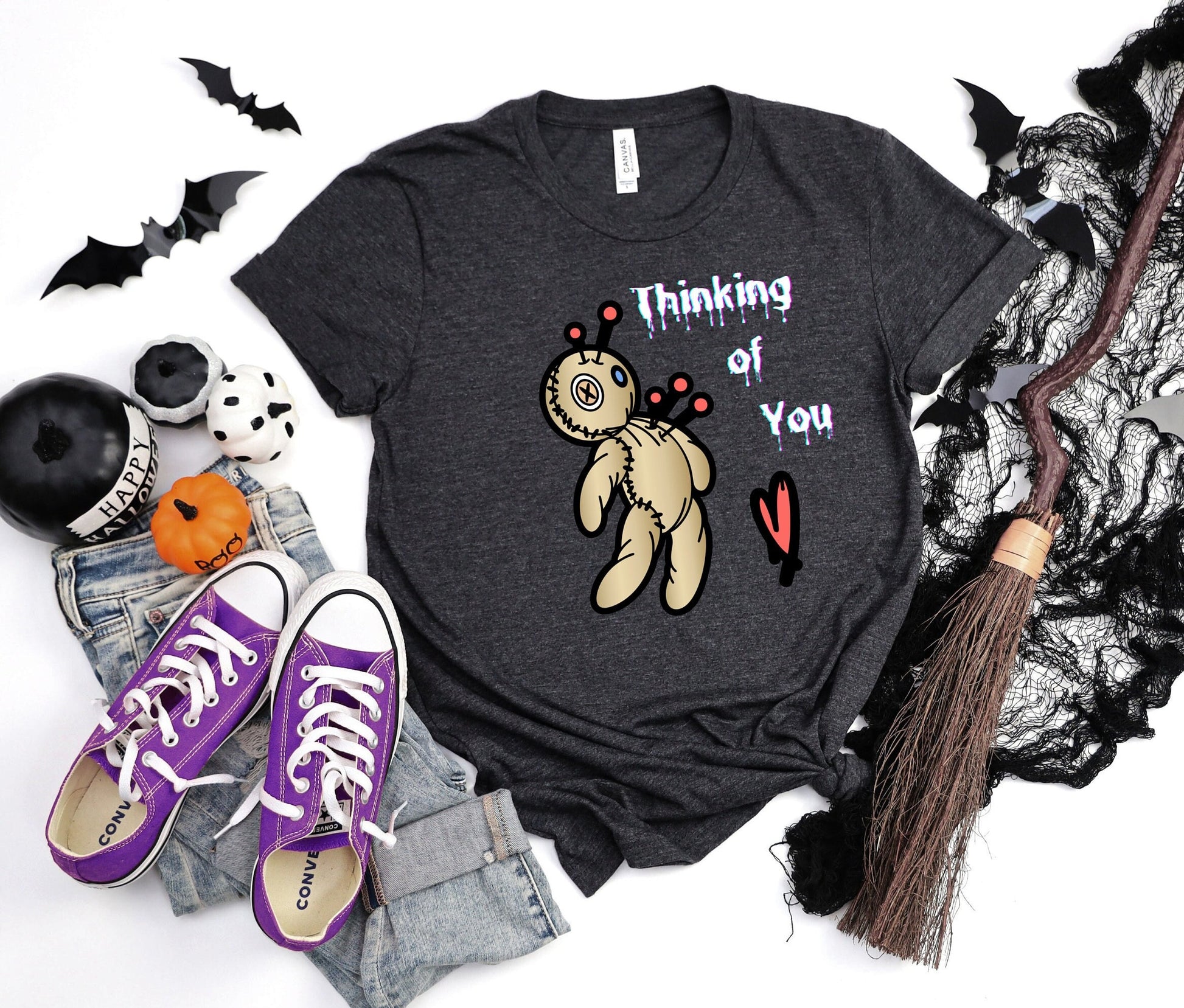 Thinking of you Voodoo doll T shirt. Scorned lover or sarcastic thoughts as voodoo doll is being stuck with pins in his heart. Hilariously cute design on a comfortable T shirt.  Perfect gift for Halloween or just for fun.
www.scorpiontees.etsy.com