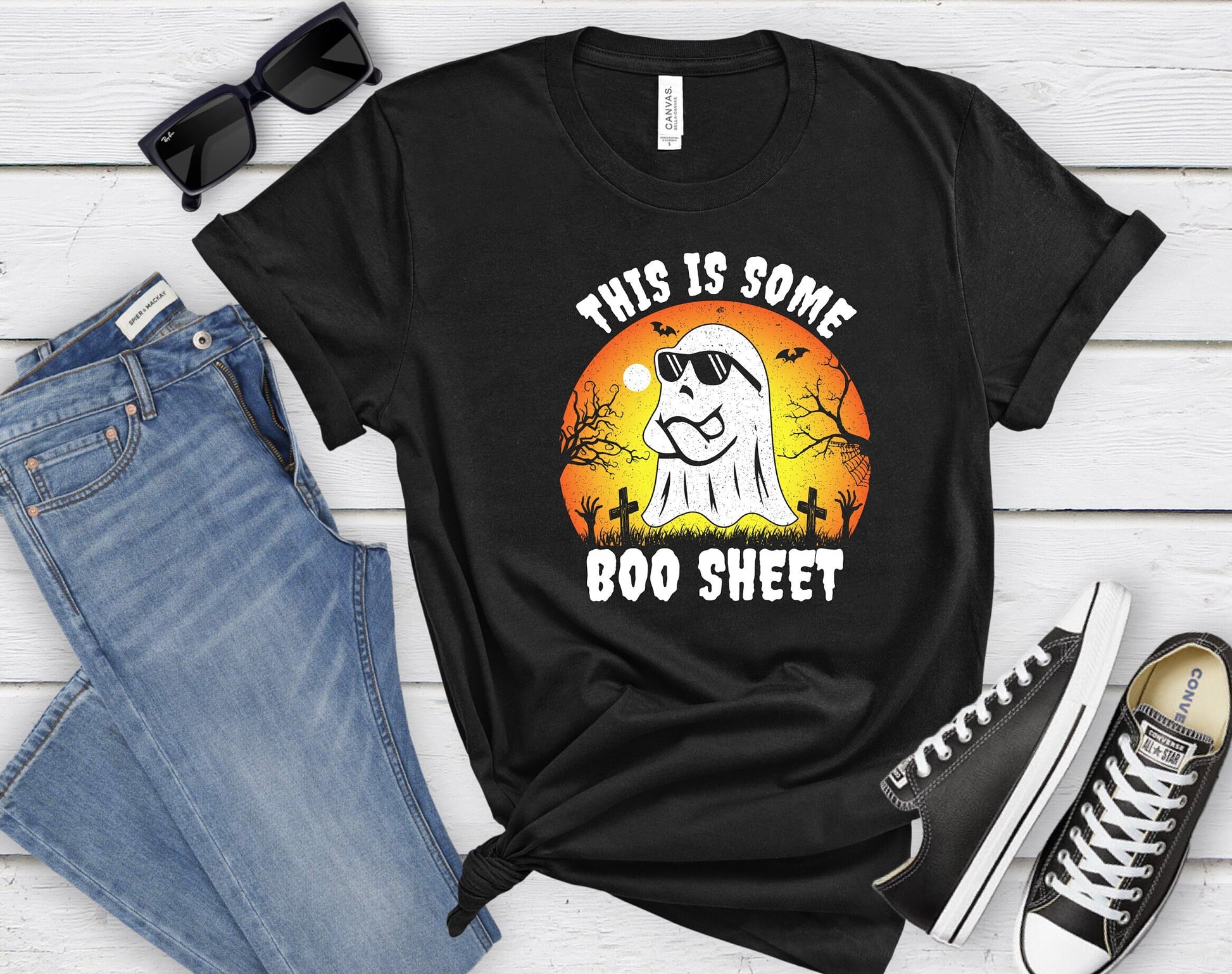 This is some Boo sheet Halloween Ghost shirt, A hilariously cute design on a stylish and comfortable T shirt. Annoyed ghost with sunglasses on a graveyard background.  A perfect Halloween gift that can be worn all year long.
www.scorpiontees.etsy.com