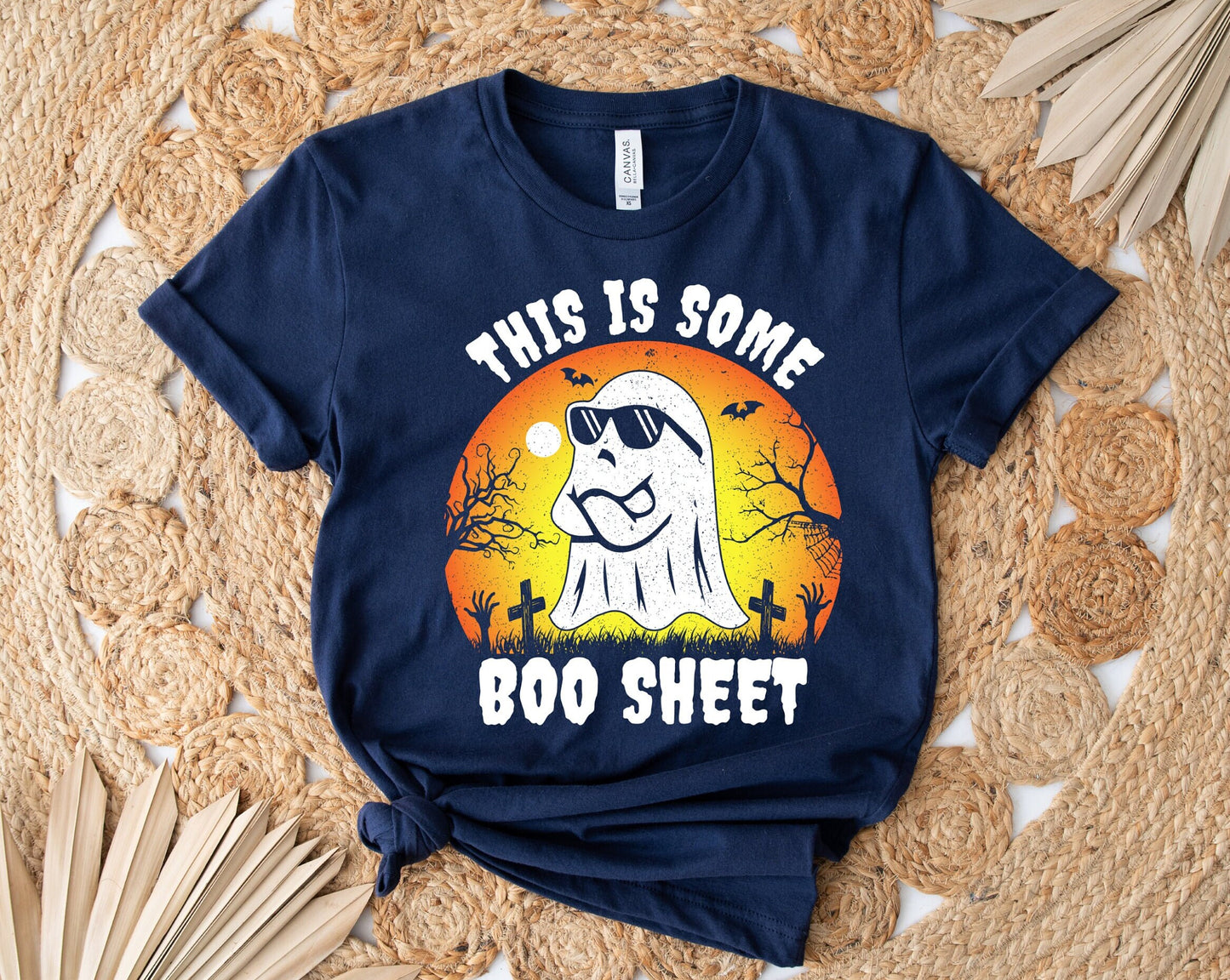 This is some Boo sheet Halloween Ghost shirt, A hilariously cute design on a stylish and comfortable T shirt. Annoyed ghost with sunglasses on a graveyard background.  A perfect Halloween gift that can be worn all year long.
www.scorpiontees.etsy.com