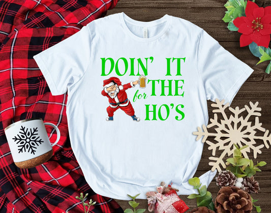 The Santa Claus Doing it for the Hos, Christmas Shirt Makes the Perfect Gift for Friends, Family, Coworkers or yourself.  Check Out My Shop for even more Great Designs.  www.scorpiontees.etsy.com