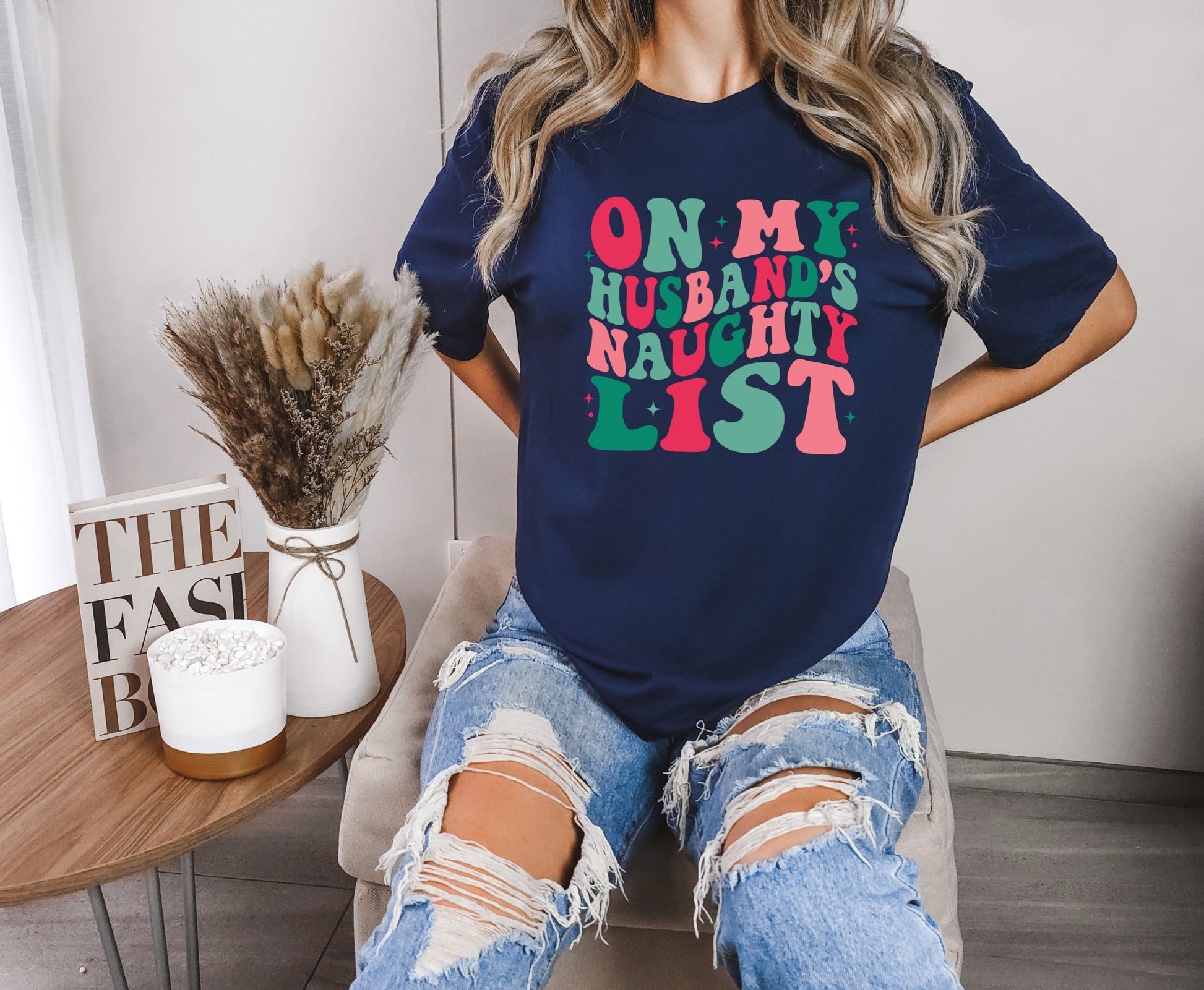 The On My Husbands Naughty List Christmas Shirt Makes the Perfect Gift for Friends, Family, Coworkers or yourself.  Check Out My Shop for even more Great Designs. www.scorpiontees.etsy.com